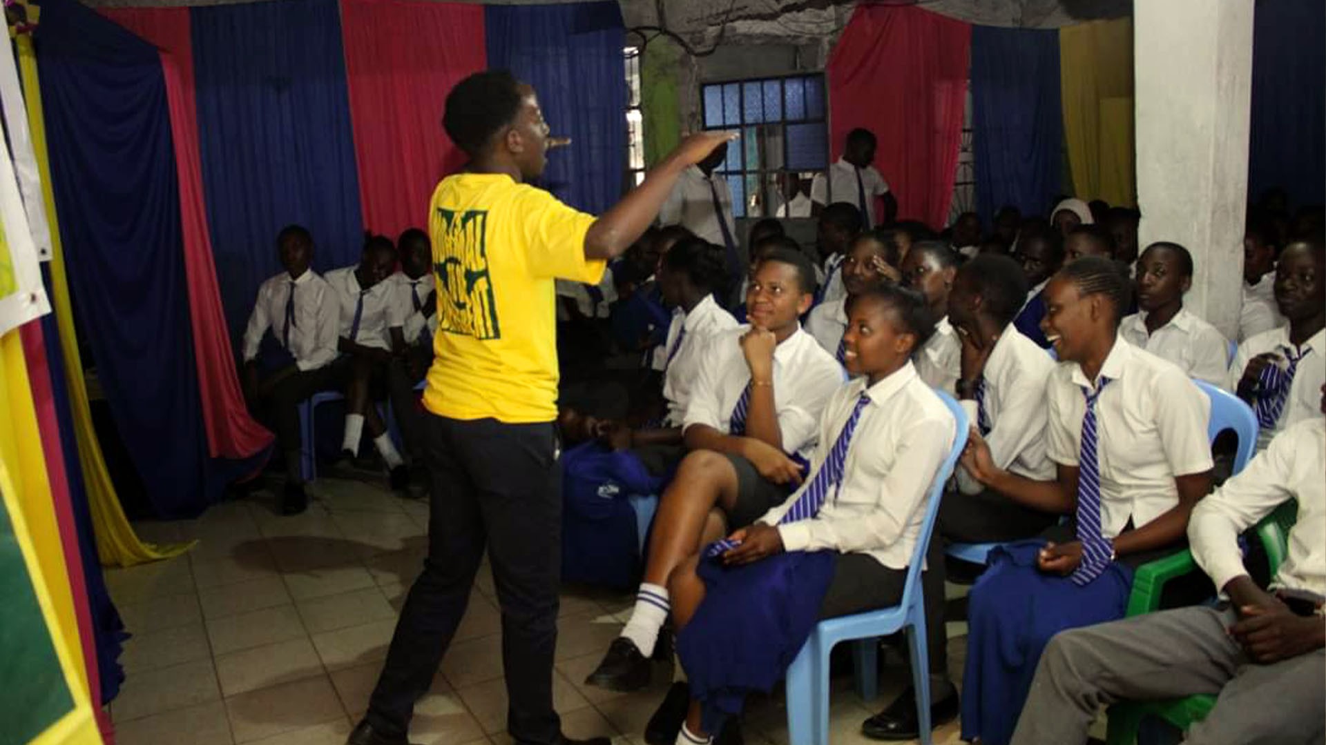 Ashford Njonjo Muiriru addressing High School Slum kids about Mental Health Awareness.